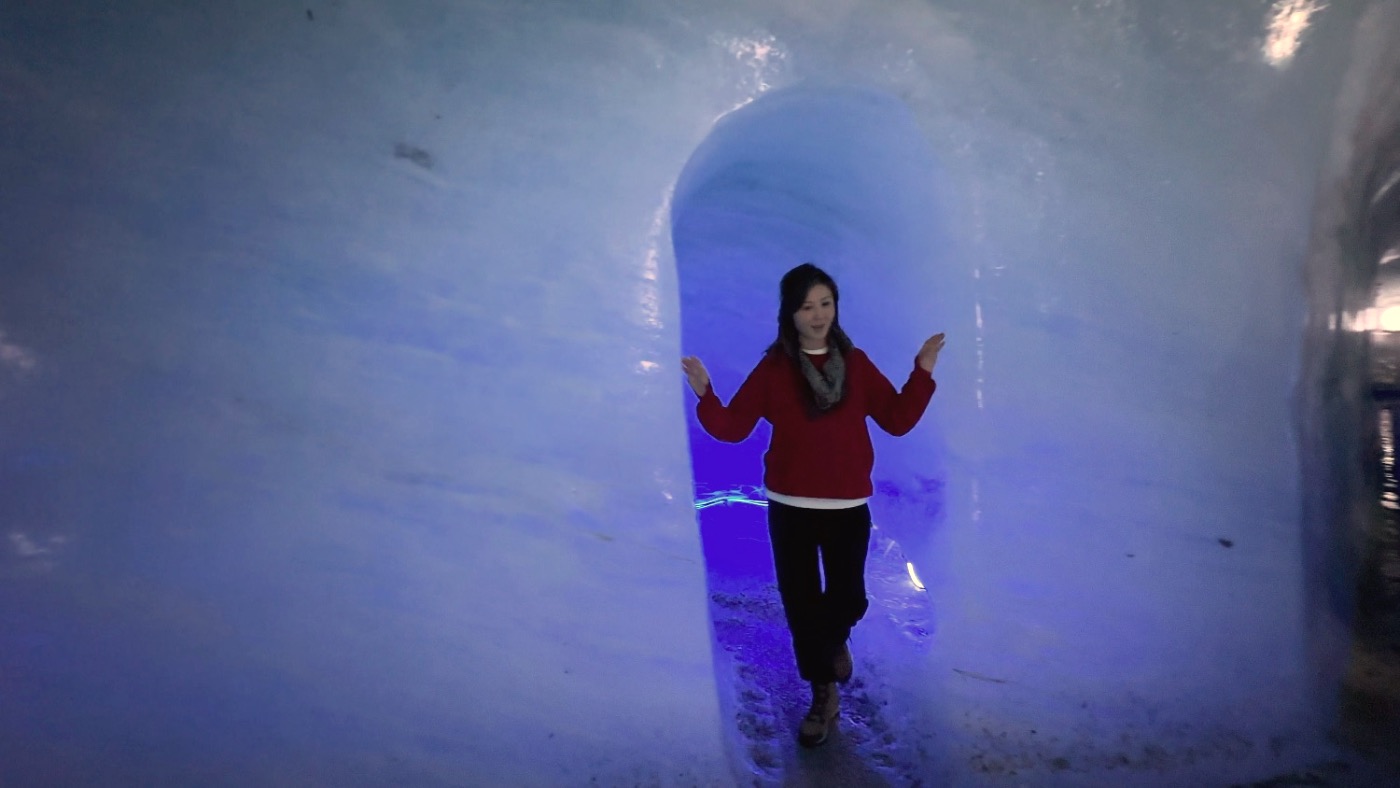 Inside the blue, hand-carved ice cave